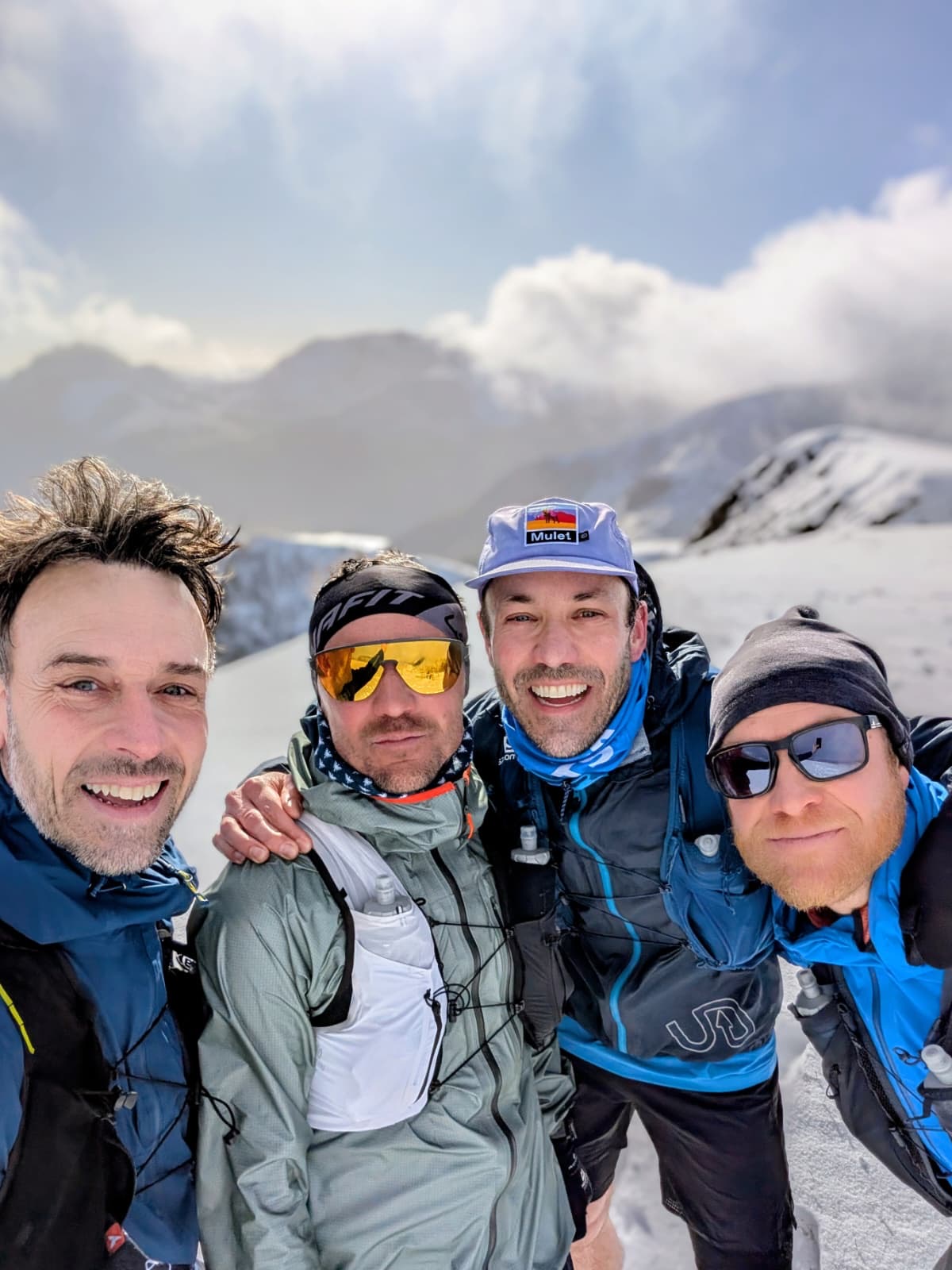 The four of us at the summit — Y Garn, March 2026